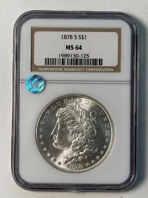 1878 San Francisco Morgan Silver Dollar NGC MS64: 1878 San Francisco Morgan Silver Dollar NGC MS64 1878 Morgan Silver Dollar certified by NGC and graded MS-64. This pre-owned coin is described as Sight White. Specifications Item Type: Morgan Silver D