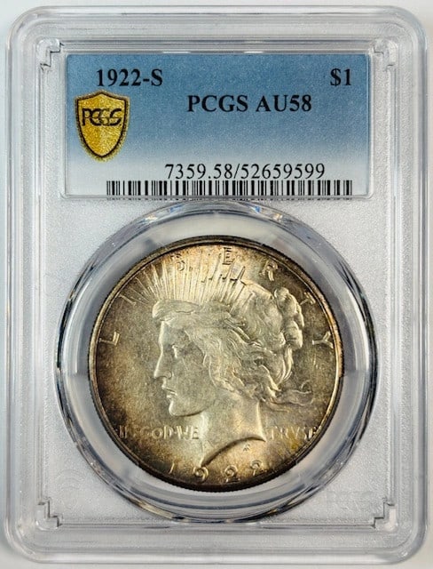1922-S Peace Dollar PCGS AU-58 Rainbow Toned Silver: 1922-S Peace Dollar PCGS AU-58 Rainbow Toned Silver This 1922 Peace Dollar is graded AU-58 by PCGS and features attractive rainbow toning. Minted in San Francisco, it is composed of silver and is a pr