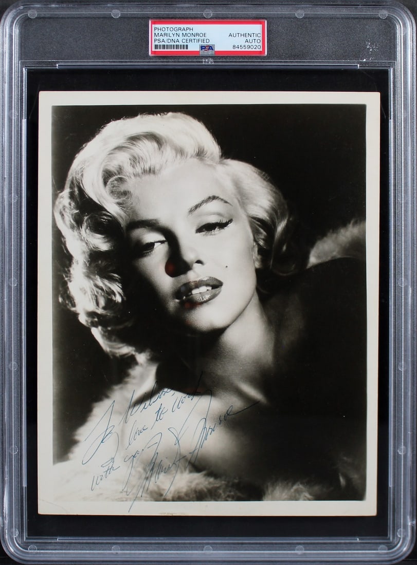 Marilyn Monroe Signed 8x10 Photo To Wilson PSA/DNA Authenticated: Marilyn Monroe Signed 8x10 Photo To Wilson PSA/DNA Authenticated This authentic 8x10 photograph of Marilyn Monroe features a personal inscription reading "To Wilson, I love to work with you." The phot
