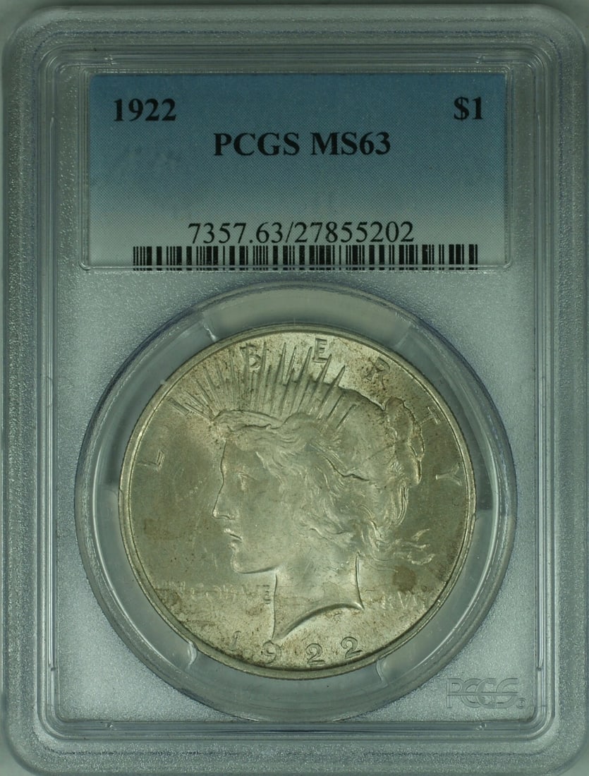 PCGS MS-63 Graded 1922 Peace Silver Dollar Philadelphia Mint: PCGS MS-63 Graded 1922 Peace Silver Dollar Philadelphia Mint This 1922 Peace Silver Dollar is a $1 coin certified by PCGS with a grade of MS-63, indicating it is uncirculated. Struck at the Philadelph