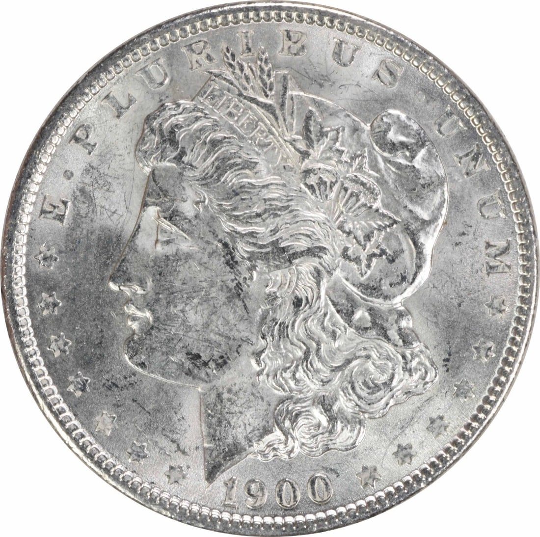 1900 BU Morgan Silver Dollar Uncirculated Uncertified US Coin: 1900 BU Morgan Silver Dollar Uncirculated Uncertified US Coin This is a 1900 Morgan Silver Dollar from the United States. The coin is uncirculated and composed of silver, with no mint mark. It is clas