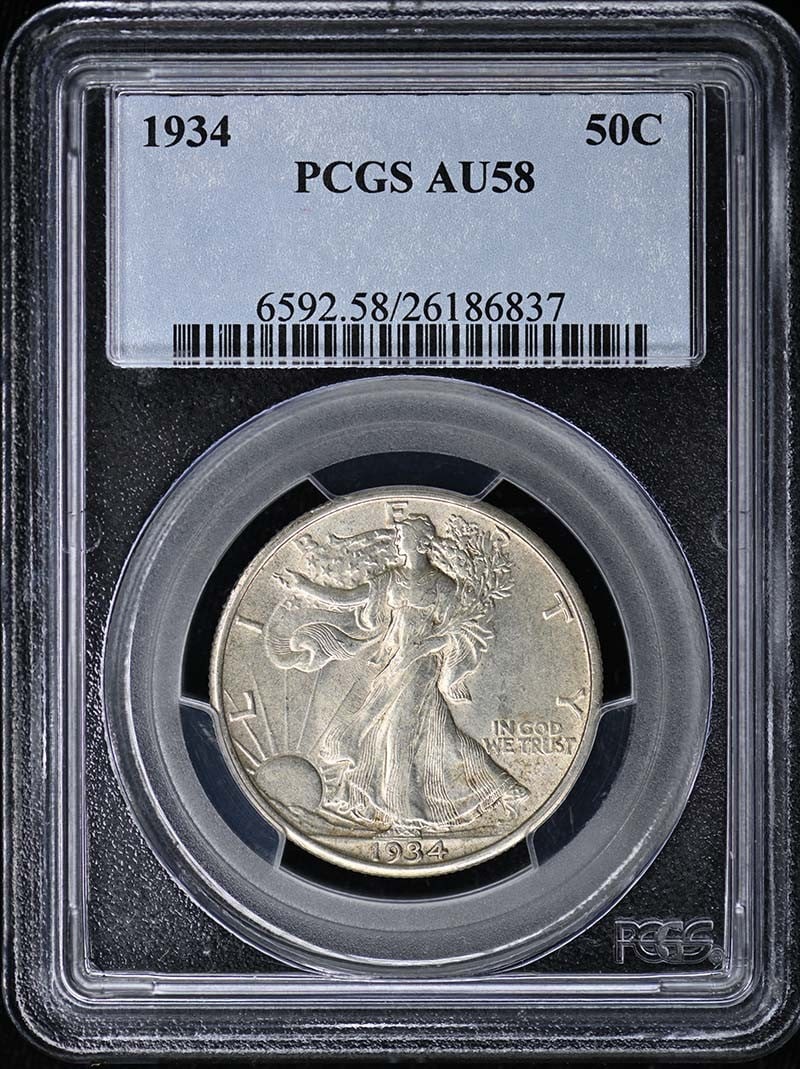 1934 Walking Liberty Half Dollar PCGS AU58 Philadelphia Mint: 1934 Walking Liberty Half Dollar PCGS AU58 Philadelphia Mint This is a 1934 Walking Liberty Half Dollar graded AU58 by PCGS. The coin was minted in Philadelphia and is in circulated, pre-owned conditi
