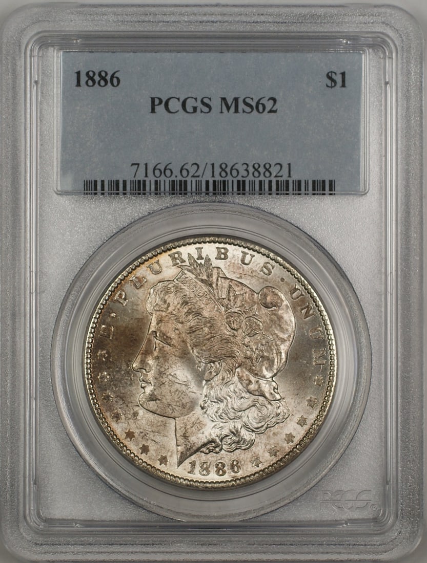 PCGS MS62 1886 Morgan silver dollar toned: PCGS MS62 1886 Morgan silver dollar toned This 1886 Morgan Silver Dollar is a $1 coin from the United States, certified by PCGS with a grade of MS 62. It is an uncirculated coin featuring attractive t