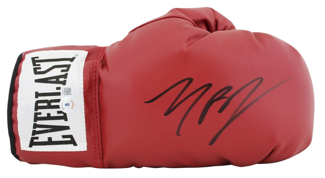 Michael B. Jordan Signed Red Everlast Boxing Glove BAS Witnessed: Michael B. Jordan Signed Red Everlast Boxing Glove BAS Witnessed This authentic right-hand boxing glove is personally signed by Michael B. Jordan, known for his role in the movie Creed. The glove feat