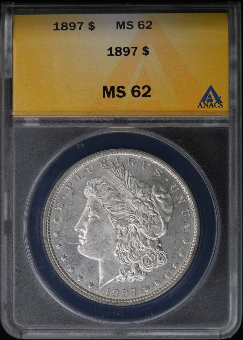 ANACS MS62 1897 Morgan Silver Dollar: ANACS MS62 1897 Morgan Silver Dollar This 1897 Morgan Dollar is a silver coin from the United States, graded MS62 by ANACS. It is uncirculated and was minted in Philadelphia. The coin is pre-owned and