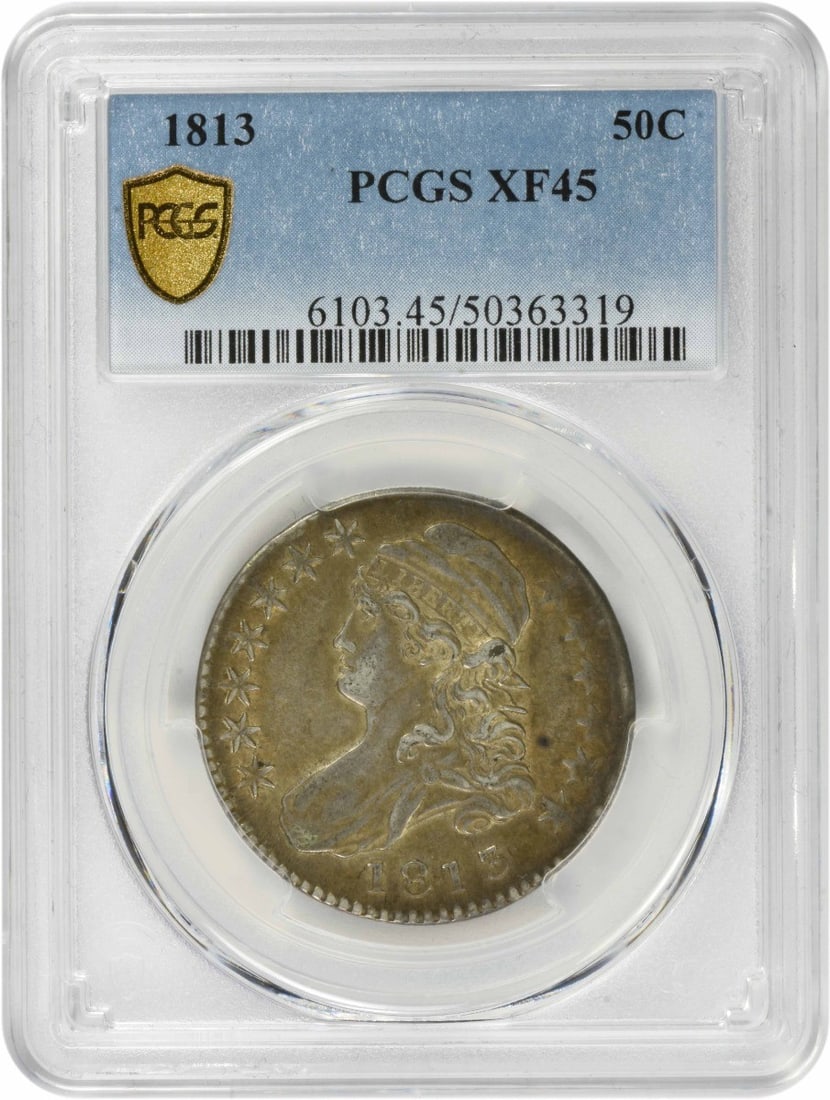 PCGS EF45 1813 Capped Bust Half Dollar Silver Coin: PCGS EF45 1813 Capped Bust Half Dollar Silver Coin This 1813 Bust Silver Half Dollar is a circulated coin graded EF45 by PCGS. Minted in Philadelphia, it is composed of 89.2% silver and 10.8% copper. 