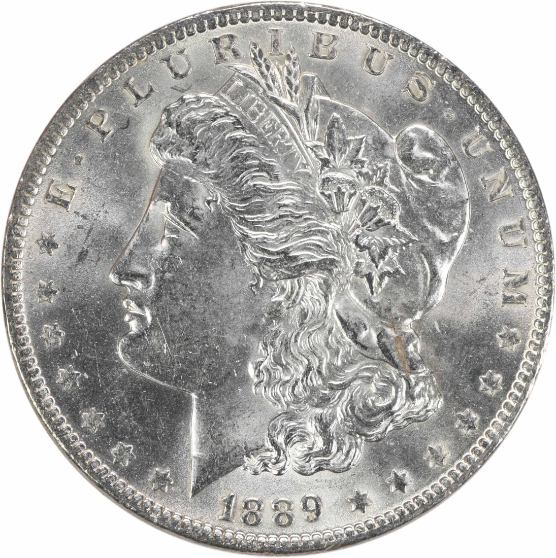 Choice BU 1889 Morgan Silver Dollar Uncirculated Uncertified Example: Choice BU 1889 Morgan Silver Dollar Uncirculated Uncertified Example This 1889 Morgan Silver Dollar is an uncirculated coin graded as Choice BU. Composed of silver, it was minted in the United States 