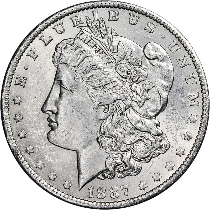 Uncirculated 1887 Over 6 O Mint Morgan Silver Dollar BU Plus Grade: Uncirculated 1887 Over 6 O Mint Morgan Silver Dollar BU Plus Grade This original 1887/6-O Morgan Silver Dollar is uncirculated and features a bright white appearance with nice luster and strike. The c