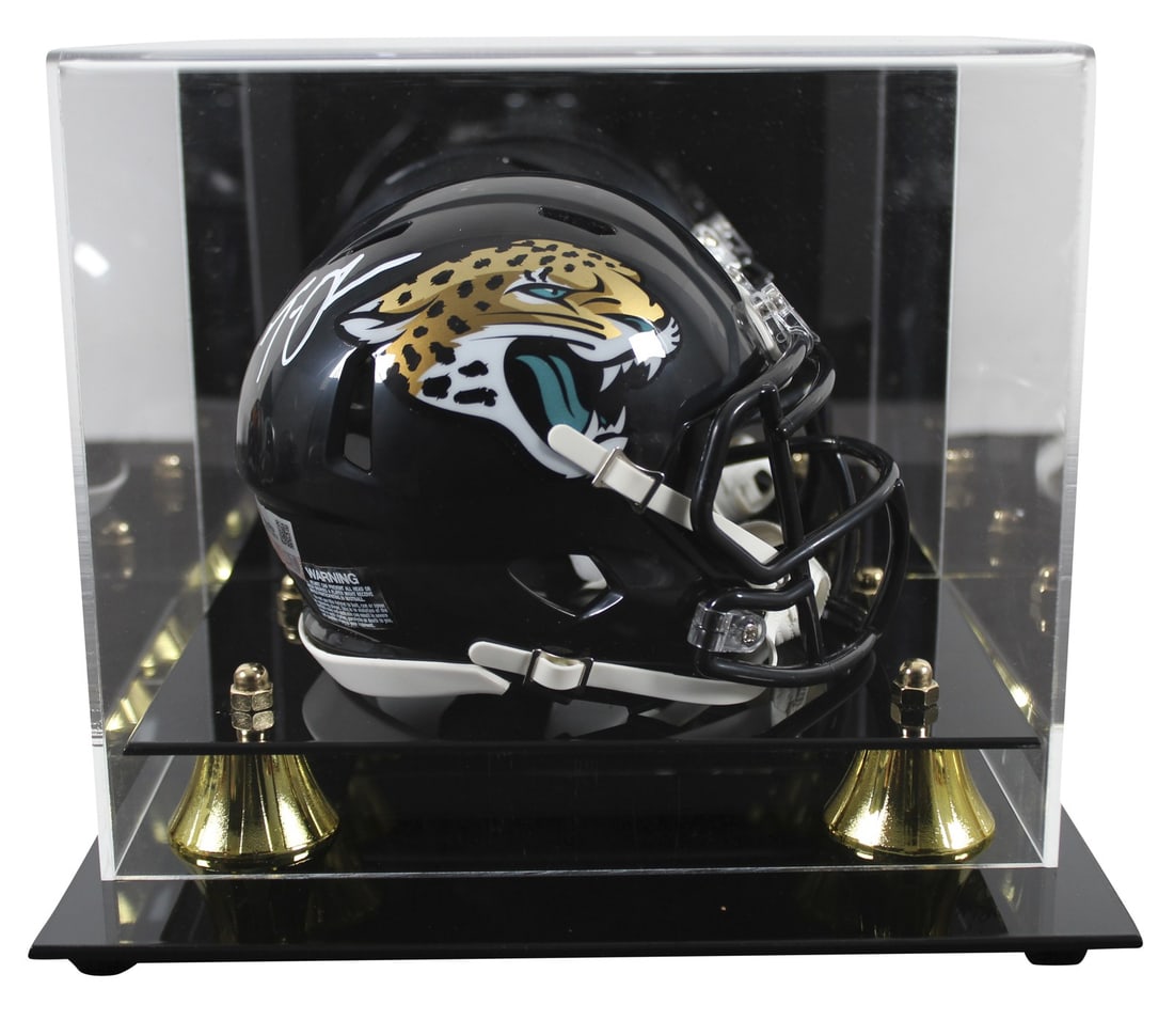 Trevor Lawrence Signed Jacksonville Jaguars Speed Mini Helmet With Fanatics Authentication Case: Trevor Lawrence Signed Jacksonville Jaguars Speed Mini Helmet With Fanatics Authentication Case This authentic Jacksonville Jaguars Speed mini helmet has been personally signed by Trevor Lawrence. It 