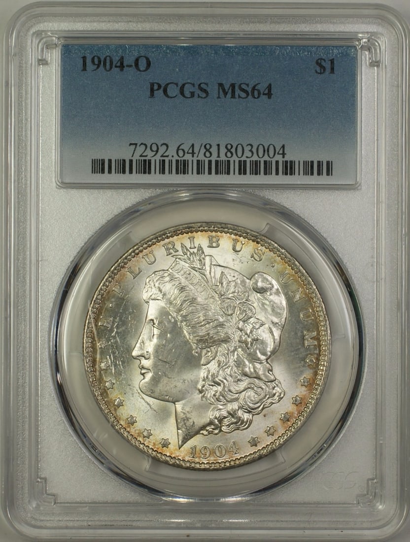 PCGS MS64 1904-O Morgan Dollar Silver Coin New Orleans Light Toning: PCGS MS64 1904-O Morgan Dollar Silver Coin New Orleans Light Toning This is a 1904-O Morgan Silver Dollar $1 coin certified by PCGS with a grade of MS 64. The coin is uncirculated, lightly toned, and 