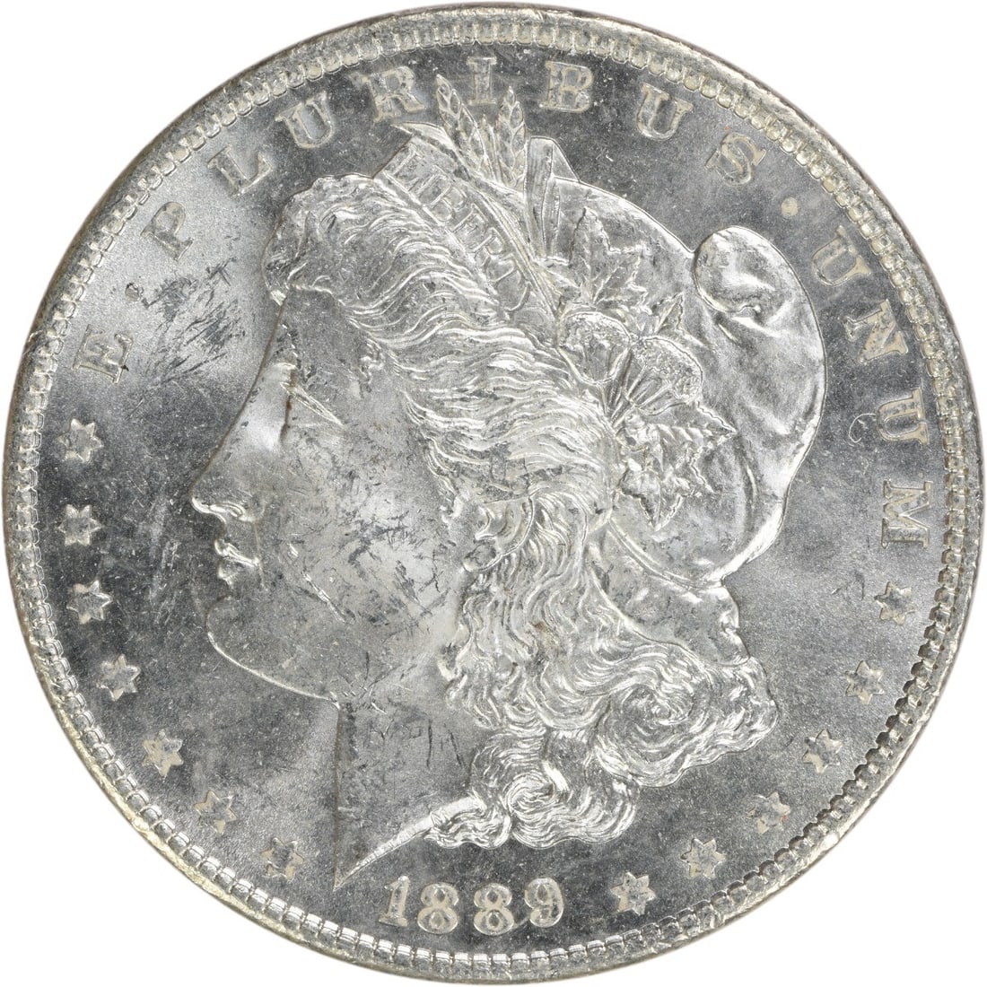 Uncirculated 1889 Silver Dollar Morgan BU No Mint Mark: Uncirculated 1889 Silver Dollar Morgan BU No Mint Mark This 1889 Morgan Silver Dollar is an uncirculated coin from the United States. It is composed of silver and features no mint mark. The coin is cl