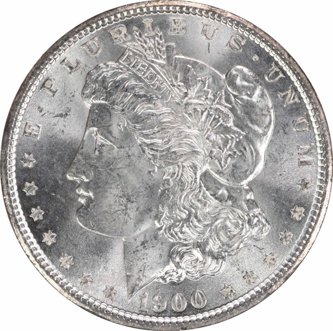 Choice BU 1900 Silver Morgan Dollar Uncirculated Uncertified Coin: Choice BU 1900 Silver Morgan Dollar Uncirculated Uncertified Coin This is an uncirculated 1900 Morgan Silver Dollar from the United States, featuring a Choice Brilliant Uncirculated (BU) grade. The co