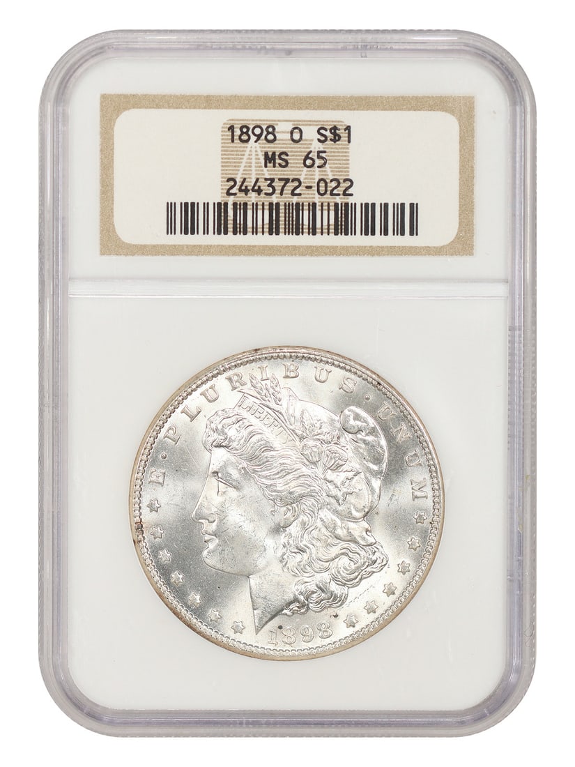 NGC MS65 1898 O Morgan Silver Dollar New Orleans Mint $1: NGC MS65 1898 O Morgan Silver Dollar New Orleans Mint $1 1898-O Morgan Dollar certified by NGC in MS65. This uncirculated example is a popular New Orleans Mint issue. As noted, most examples display a