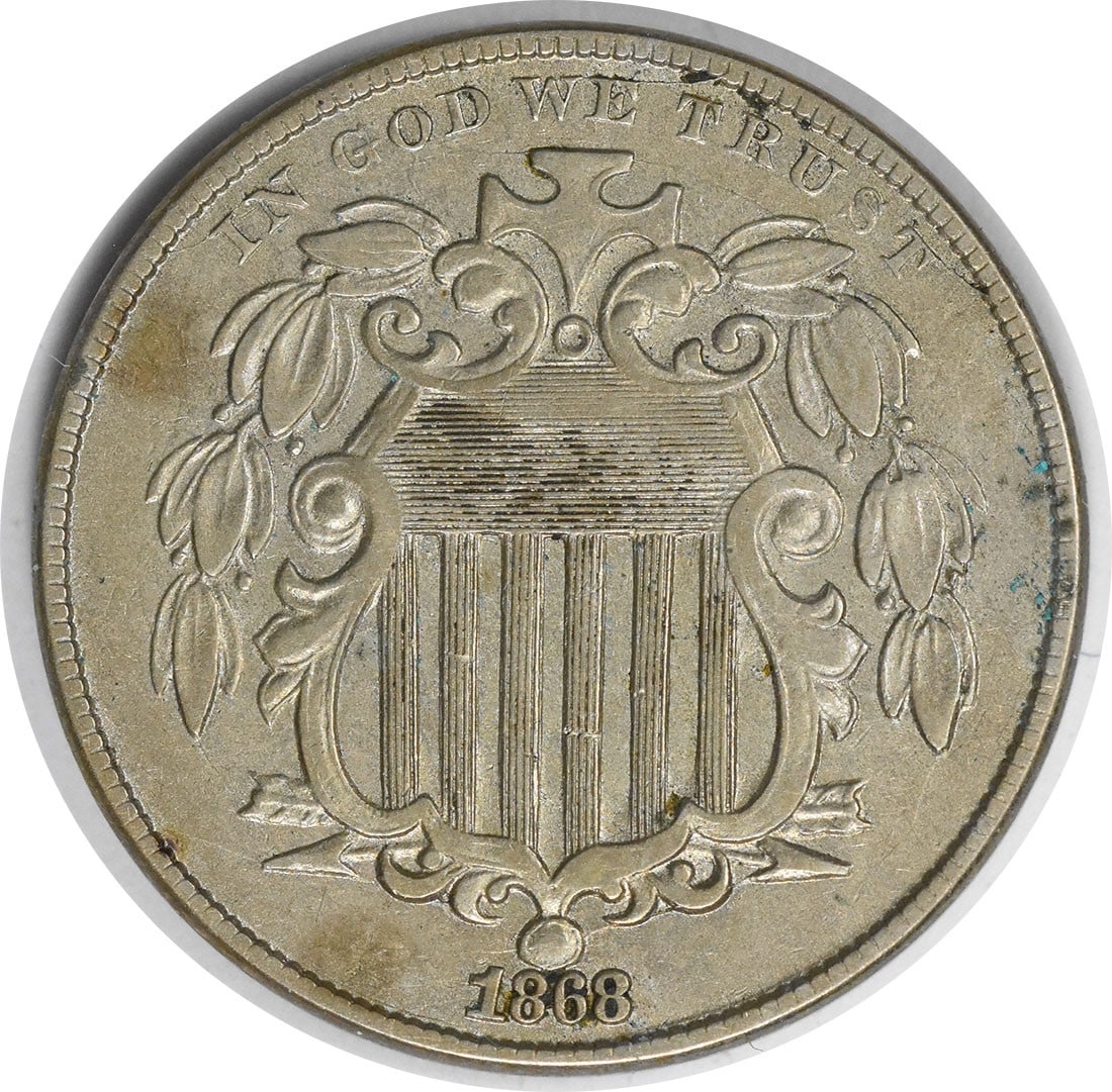 1868 5C Shield Nickel AU Philadelphia Uncertified: 1868 5C Shield Nickel AU Philadelphia Uncertified 1868 Shield Nickel in AU grade. This pre-owned United States 5-cent coin is an uncertified, circulated example of the Shield design by James Barton Lo