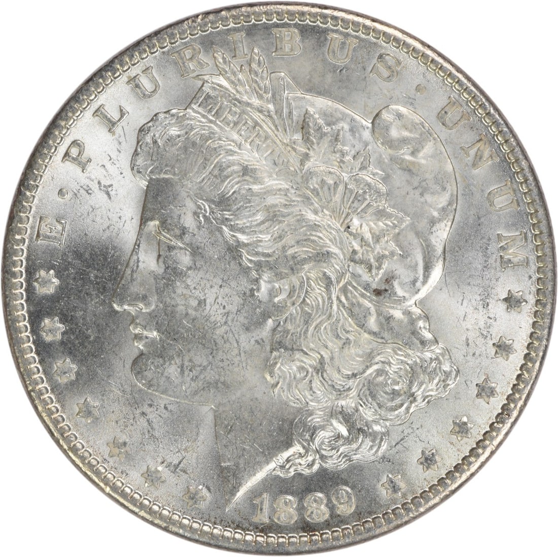 Brilliant Uncirculated 1889 Morgan Silver Dollar Uncertified Coin: Brilliant Uncirculated 1889 Morgan Silver Dollar Uncertified Coin This 1889 Morgan Silver Dollar is an uncirculated coin with brilliant uncirculated (BU) grade. It is composed of silver and does not h