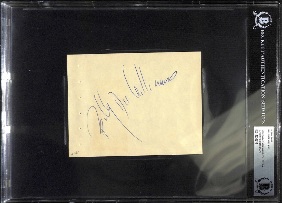 Billy Dee Williams Signed Star Wars Album Page Beckett Authenticated: Billy Dee Williams Signed Star Wars Album Page Beckett Authenticated This is an original autographed album page signed in blue permanent marker by Billy Dee Williams, famously known for his role as La