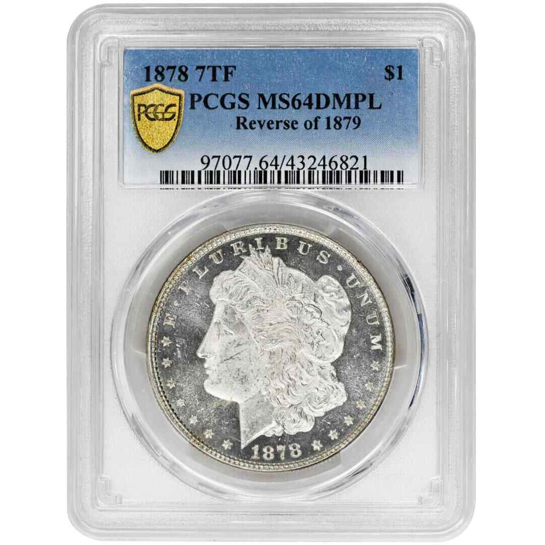 1878 7TF Morgan Dollar Reverse of 1879 PCGS MS64DMPL: 1878 7TF Morgan Dollar Reverse of 1879 PCGS MS64DMPL This 1878 7 Tail Feathers Morgan Dollar features the reverse design of 1879 and is composed of silver. Graded MS64 Deep Mirror Proof-Like (DMPL) by