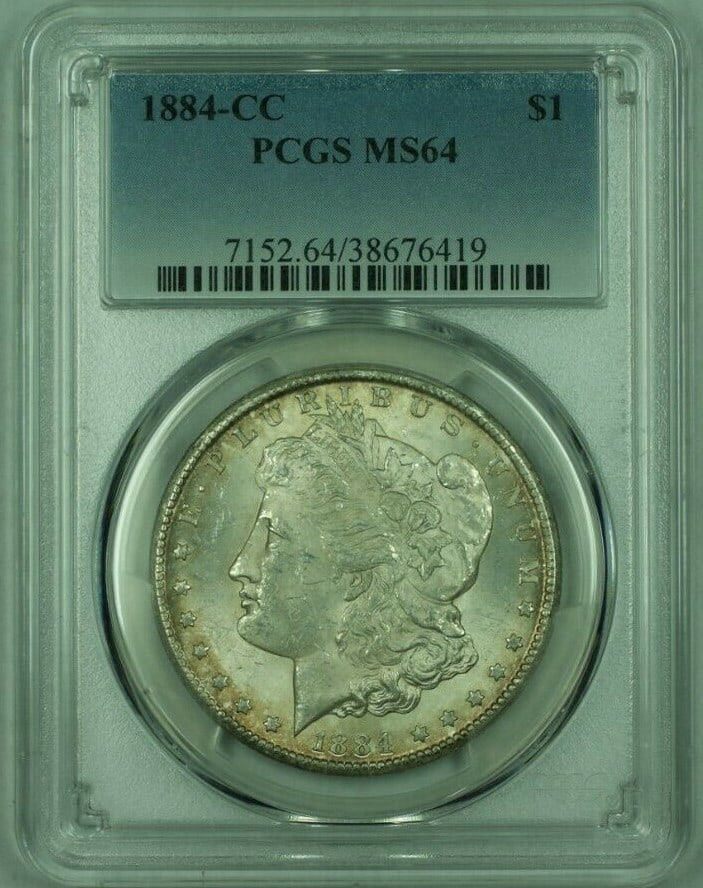 PCGS MS-64 1884-CC Carson City Morgan Dollar with Light Toning: PCGS MS-64 1884-CC Carson City Morgan Dollar with Light Toning This 1884-CC Morgan Silver Dollar features attractive light toning and is graded MS-64 by PCGS. Minted in Carson City, this uncirculated 