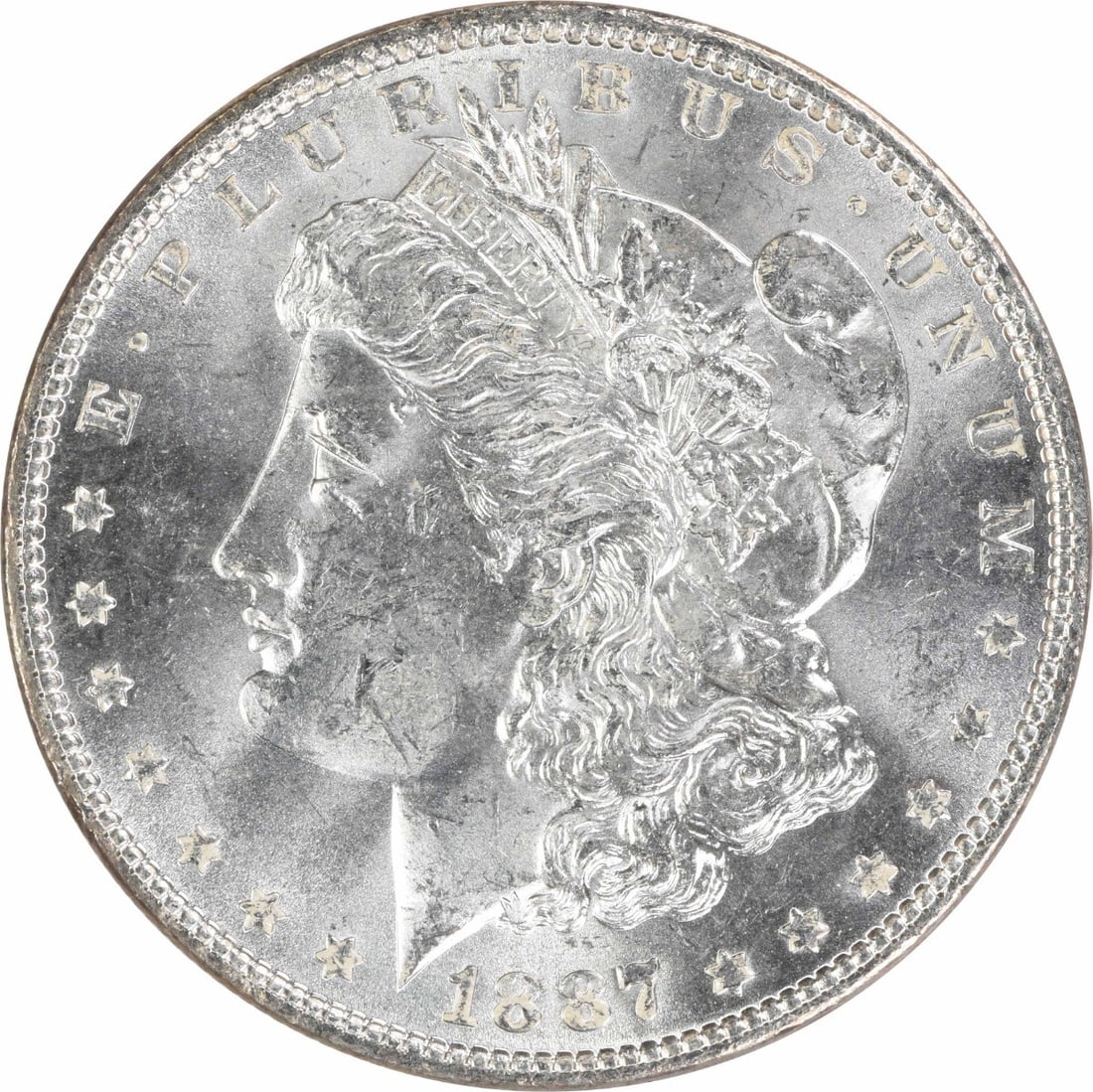 1887 Uncirculated Morgan Silver Dollar $1 Uncertified: 1887 Uncirculated Morgan Silver Dollar $1 Uncertified 1887 Morgan Silver Dollar offered in uncirculated condition. This pre-owned coin is uncertified and identified as grade MS60. Specifications Coin: