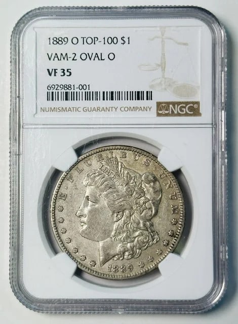 NGC VF-35 1889 O Morgan Silver Dollar VAM-2 Oval O: NGC VF-35 1889 O Morgan Silver Dollar VAM-2 Oval O 1889-O Morgan Silver Dollar certified by NGC and graded VF-35. This silver dollar is identified as the O VAM-2 OVAL O variety and is a pre-owned coin