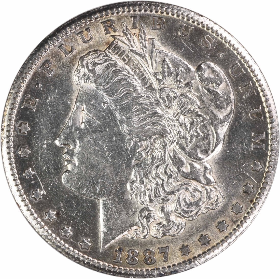 San Francisco Mint 1887 Morgan Dollar 90 Silver AU Grade Uncertified: San Francisco Mint 1887 Morgan Dollar 90 Silver AU Grade Uncertified This is an 1887-S Morgan Silver Dollar from the San Francisco Mint, featuring a composition of 90% silver and 10% copper. Designed 