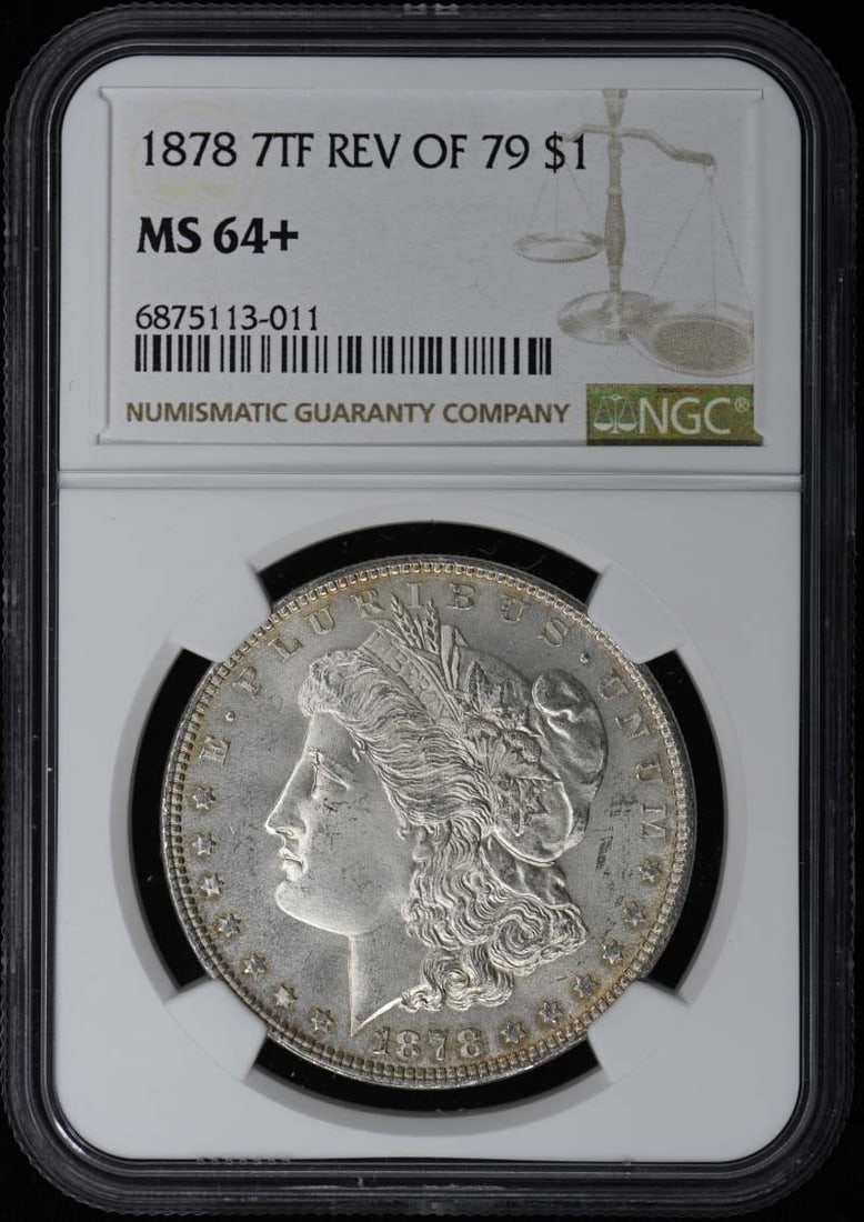 NGC MS64+ 1878 7TF Rev of 79 Morgan Silver Dollar: NGC MS64+ 1878 7TF Rev of 79 Morgan Silver Dollar 1878 7TF Rev of 79 Morgan Dollar certified by NGC and graded MS64+. This uncirculated United States silver dollar is a pre-owned example of the Morgan