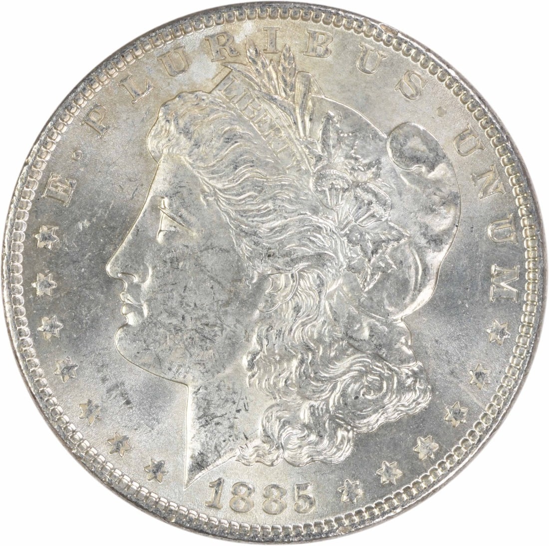 1885 Uncirculated Morgan Silver Dollar Philadelphia Mint $1: 1885 Uncirculated Morgan Silver Dollar Philadelphia Mint $1 An 1885 Morgan Silver Dollar in uncirculated condition, uncertified and graded MS60. This United States coin has a $1 denomination and featu