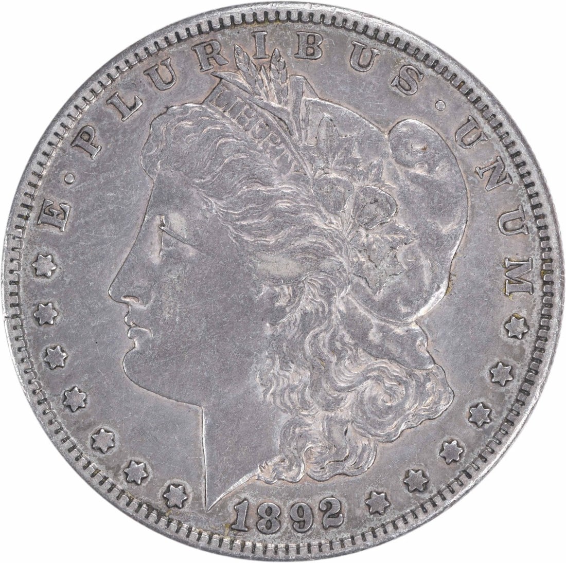 1892-S Morgan Silver Dollar XF Uncertified San Francisco Coin: 1892-S Morgan Silver Dollar XF Uncertified San Francisco Coin This 1892-S Morgan Silver Dollar showcases the iconic design by George T. Morgan, representing a significant piece of American numismatic 
