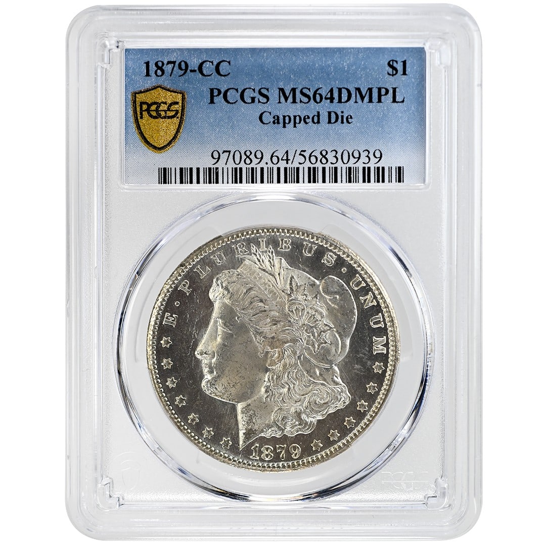 1879 Carson City Morgan Silver Dollar Capped Die PCGS MS64DMPL: 1879 Carson City Morgan Silver Dollar Capped Die PCGS MS64DMPL 1879-CC Morgan Dollar featuring the Capped Die variety. This silver $1 coin is graded PCGS MS64DMPL and described as uncirculated. The or