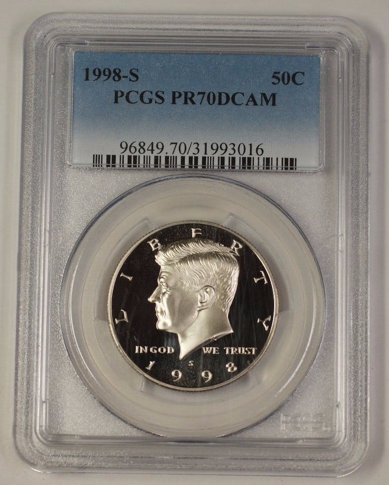 PCGS PR70 DCAM 1998-S Kennedy Proof Half Dollar Clad Coin: PCGS PR70 DCAM 1998-S Kennedy Proof Half Dollar Clad Coin This is a 1998-S United States Kennedy Half Dollar 50-cent coin, certified by PCGS as PR-70 Deep Cameo (DCAM), indicating a perfect, uncircula