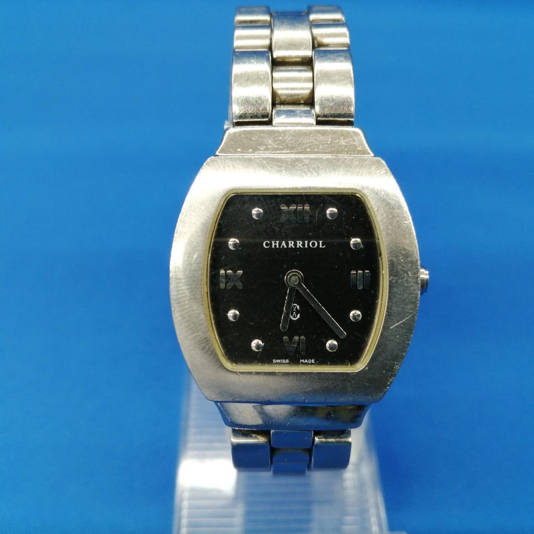 CHARRIOL AZURT womens quartz stainless steel wristwatch: CHARRIOL AZURT womens quartz stainless steel wristwatch CHARRIOL AZURT quartz women's wristwatch, made in Switzerland, with a stainless steel case and band. This pre-owned watch is offered as watch on