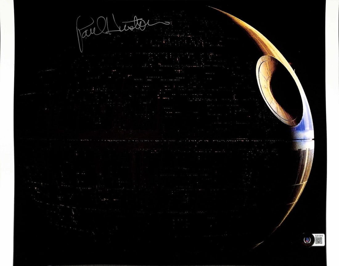 Beckett Authenticated Paul Huston Signed 11x14 Death Star Photo: Beckett Authenticated Paul Huston Signed 11x14 Death Star Photo This 11x14 photograph features the iconic Death Star from the Star Wars saga and is personally hand-signed by Paul Huston, a renowned mo
