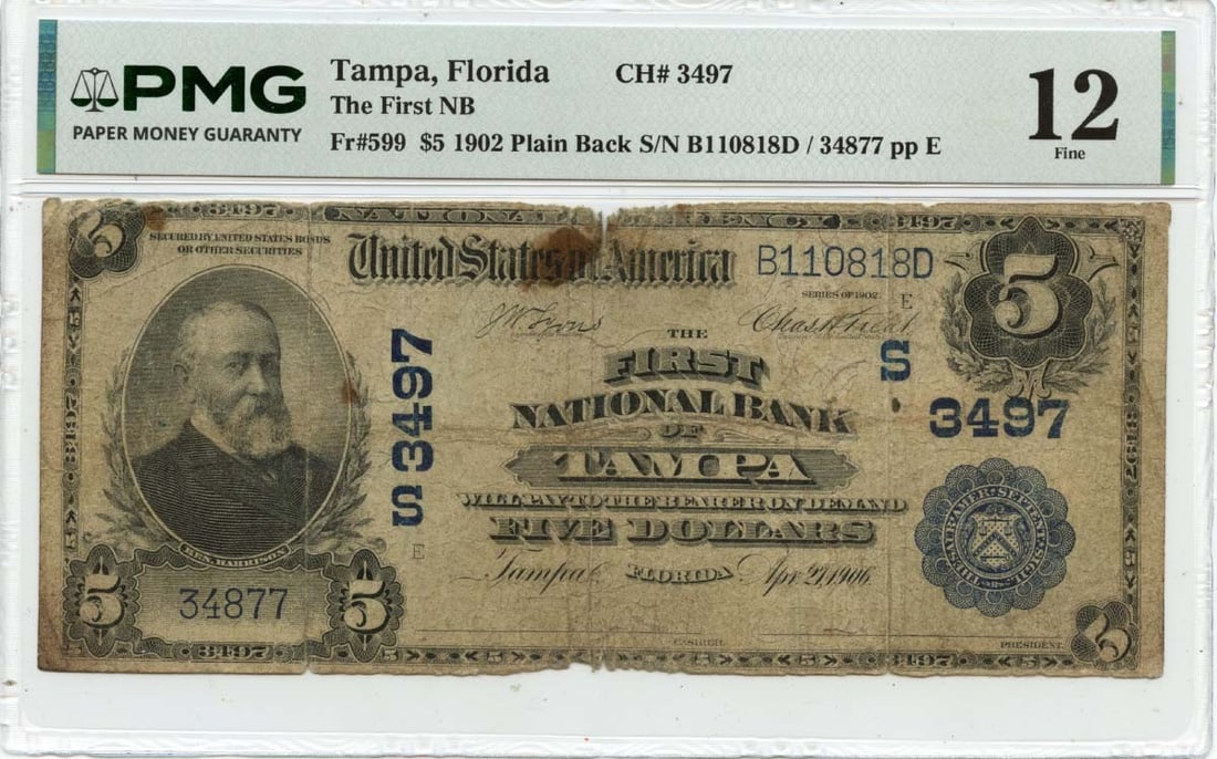 1902 Five Dollar National Currency Tampa Florida PMG F12 CH#3497: 1902 Five Dollar National Currency Tampa Florida PMG F12 CH#3497 This is a 1902 $5 National Bank Note from the First National Bank of Tampa, Florida, cataloged as Friedberg #599 with Charter #3497. Th