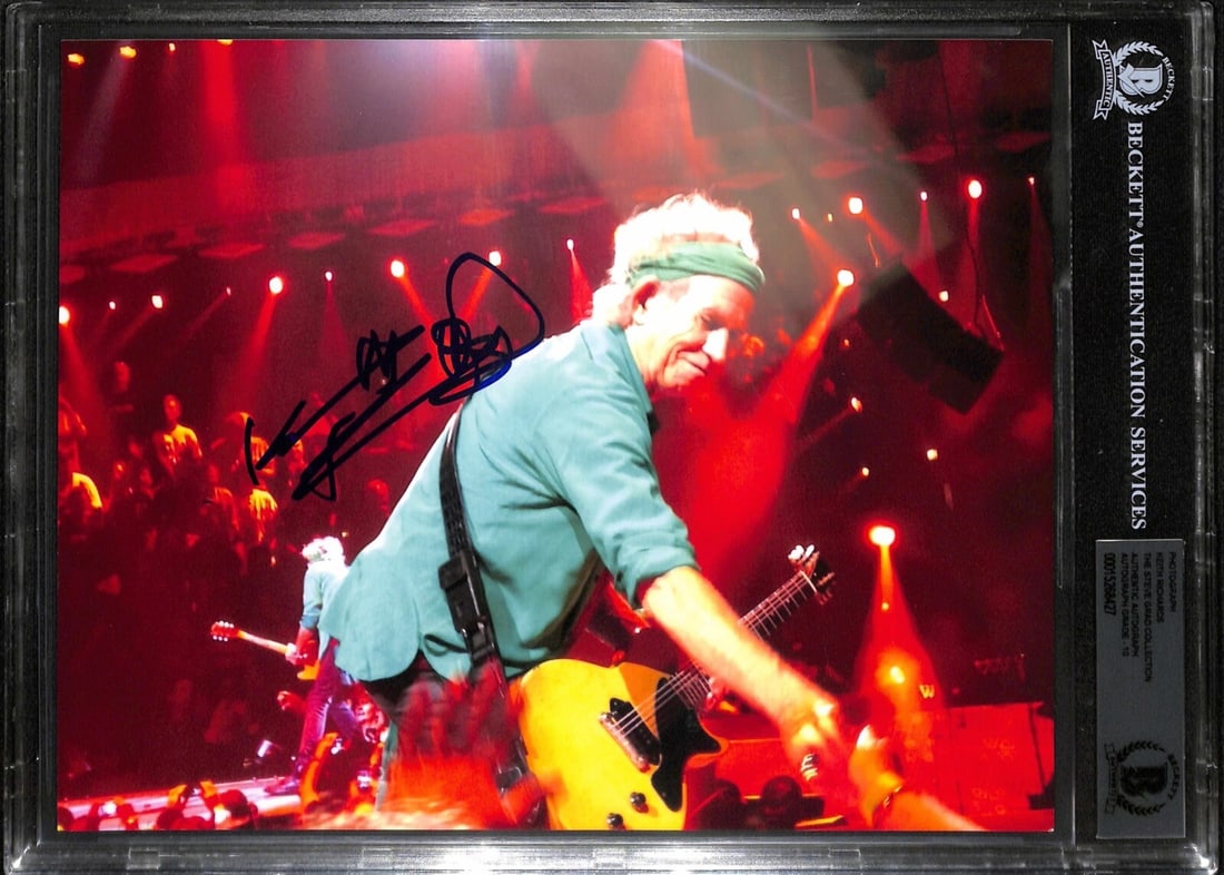 Keith Richards Autographed 8x10 Photograph Beckett 10 Rolling Stones Guitarist: Keith Richards Autographed 8x10 Photograph Beckett 10 Rolling Stones Guitarist This is an original 8x10 color photograph signed by Keith Richards, guitarist for the Rolling Stones, in blue permanent m
