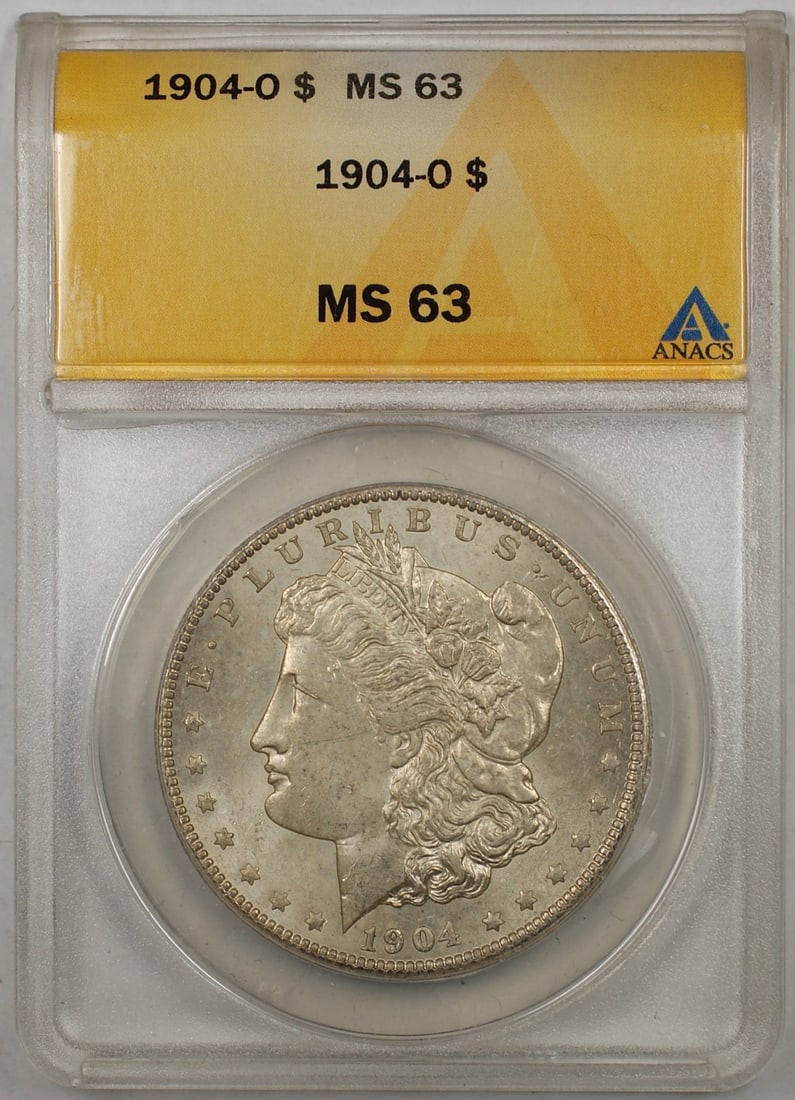 ANACS MS63 1904-O Morgan Silver Dollar Lightly Toned: ANACS MS63 1904-O Morgan Silver Dollar Lightly Toned This 1904-O Morgan Silver Dollar features a lightly toned finish and has been graded MS-63 by ANACS. Minted in New Orleans, this uncirculated coin 