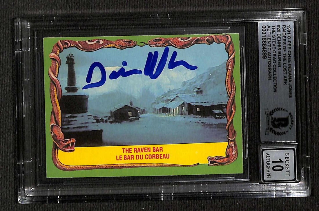 1981 O-Pee-Chee Raiders of the Lost Ark Beckett 10 Dennis Muren card: 1981 O-Pee-Chee Raiders of the Lost Ark Beckett 10 Dennis Muren card This is a signed 1981 O-Pee-Chee "The Raven Bar" trading card from Raiders of the Lost Ark, featuring the autograph of renowned vis