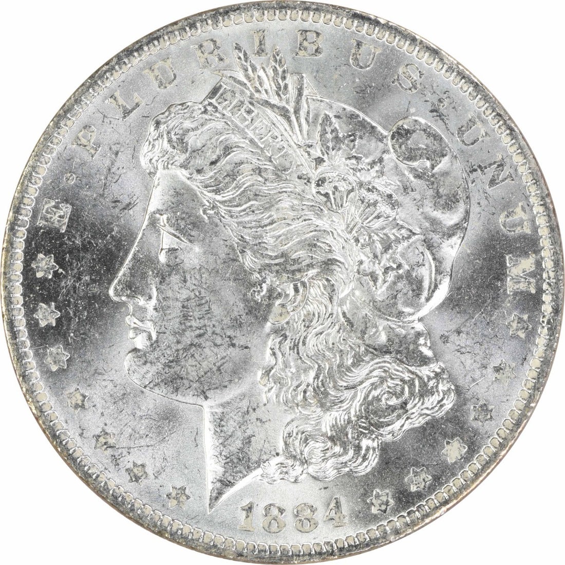 1884 O Morgan $1 Silver Coin Uncirculated Uncertified: 1884 O Morgan $1 Silver Coin Uncirculated Uncertified 1884-O Morgan Silver Dollar in uncirculated, pre-owned condition. This silver $1 coin is listed as uncertified and graded MS60. Specifications Coi