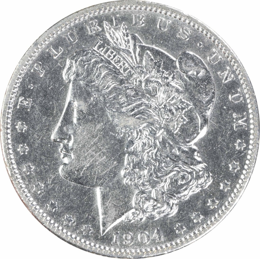 1904 Uncertified AU Morgan Silver Dollar $1 Coin: 1904 Uncertified AU Morgan Silver Dollar $1 Coin 1904 Morgan Silver Dollar in About Uncirculated (AU) grade. This pre-owned coin is an uncertified, circulated example struck in silver and issued in th