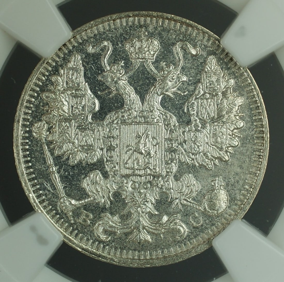 NGC MS63 1914 Russian silver 15 kopeck coin: NGC MS63 1914 Russian silver 15 kopeck coin This is a 1914 Russia 15 Kopeck silver coin, graded MS-63 by NGC. The coin is uncirculated and features the classic double-headed eagle design with heraldic