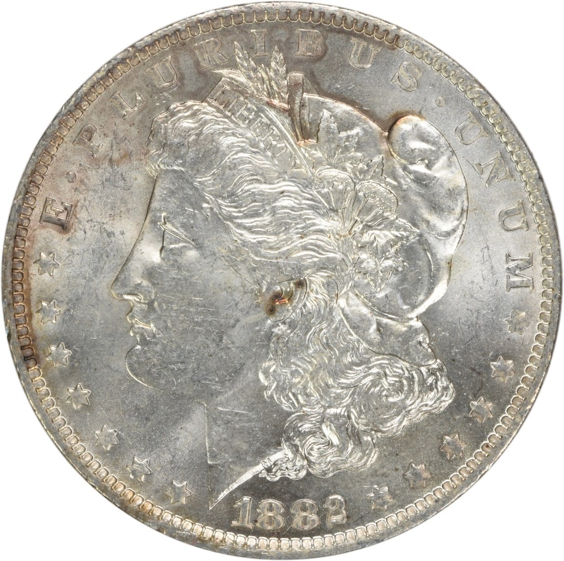 Uncirculated 1882 O Silver Dollar Morgan Type Brilliant Uncertified US Coin: Uncirculated 1882 O Silver Dollar Morgan Type Brilliant Uncertified US Coin This 1882-O Morgan Silver Dollar is an uncirculated coin from the United States, featuring a brilliant uncirculated (BU) gra