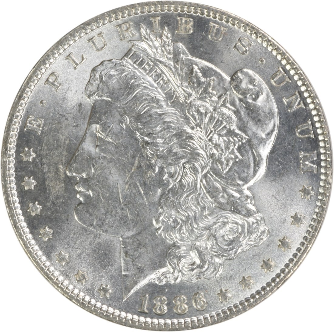 Brilliant Uncirculated 1886 Silver Morgan Dollar No Mint Mark Uncertified: Brilliant Uncirculated 1886 Silver Morgan Dollar No Mint Mark Uncertified This is an 1886 Morgan Silver Dollar from the United States, featuring a brilliant uncirculated (BU) grade. The coin is uncert