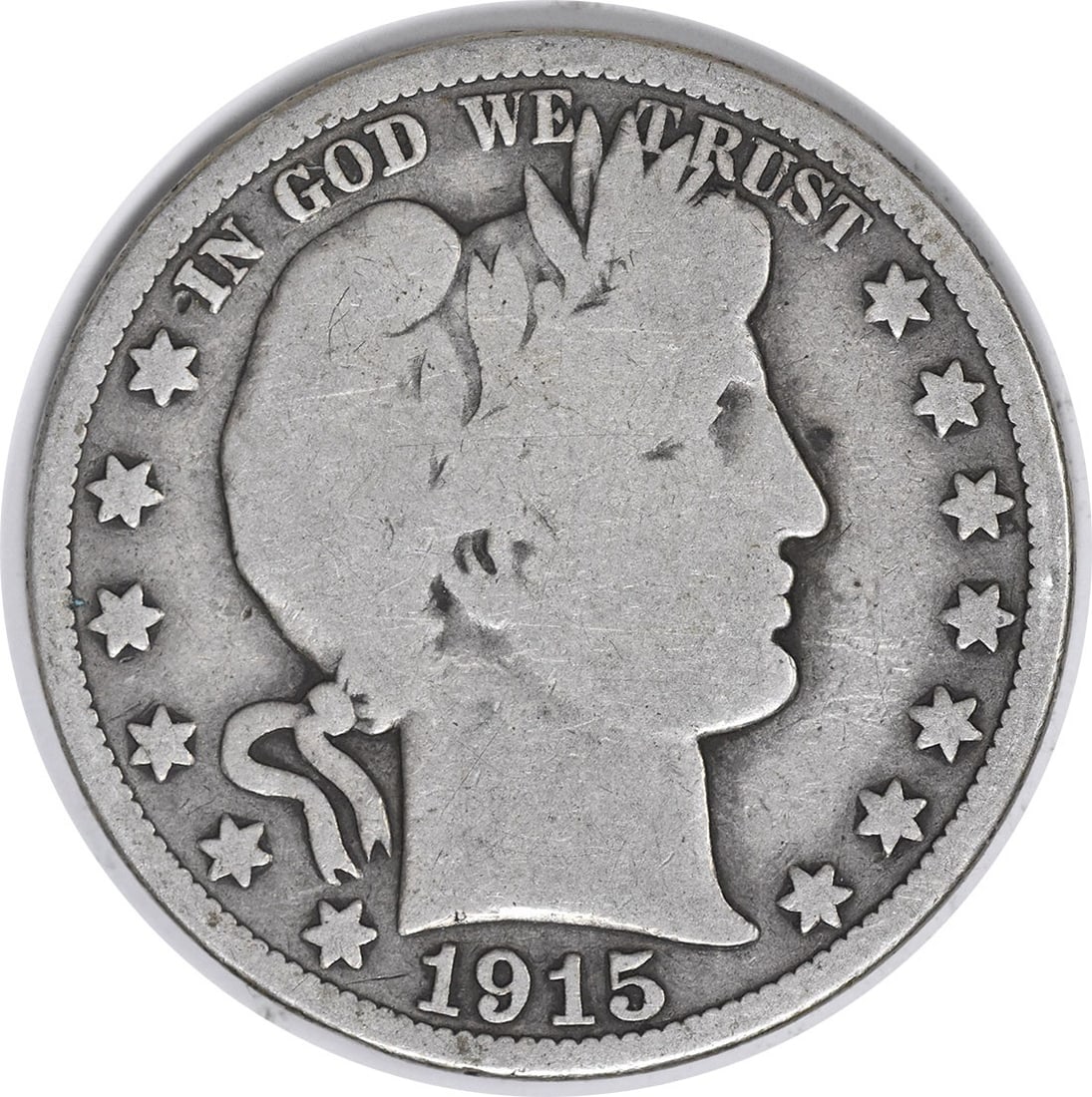 1915 United States Barber 50C Silver Half Dollar VG: 1915 United States Barber 50C Silver Half Dollar VG 1915 Barber Half Dollar coin in circulated, pre-owned condition. This uncertified example is graded VG and struck in silver. Denomination is 50C. Sp