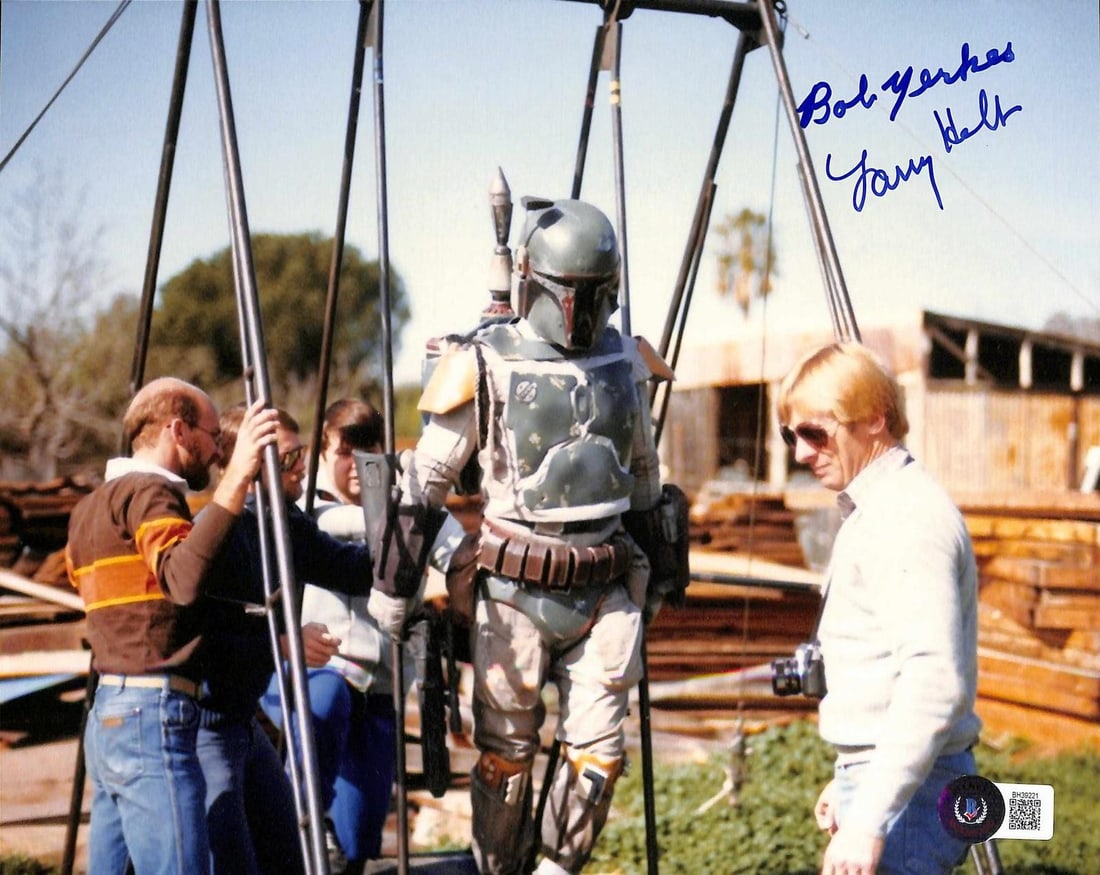 Beckett Authenticated Star Wars ROTJ 8x10 Photo Signed by Bob Yerkes and Larry Holt: Beckett Authenticated Star Wars ROTJ 8x10 Photo Signed by Bob Yerkes and Larry Holt This 8x10 inch photograph captures a behind-the-scenes stunt preparation moment from the production of Star Wars: Re