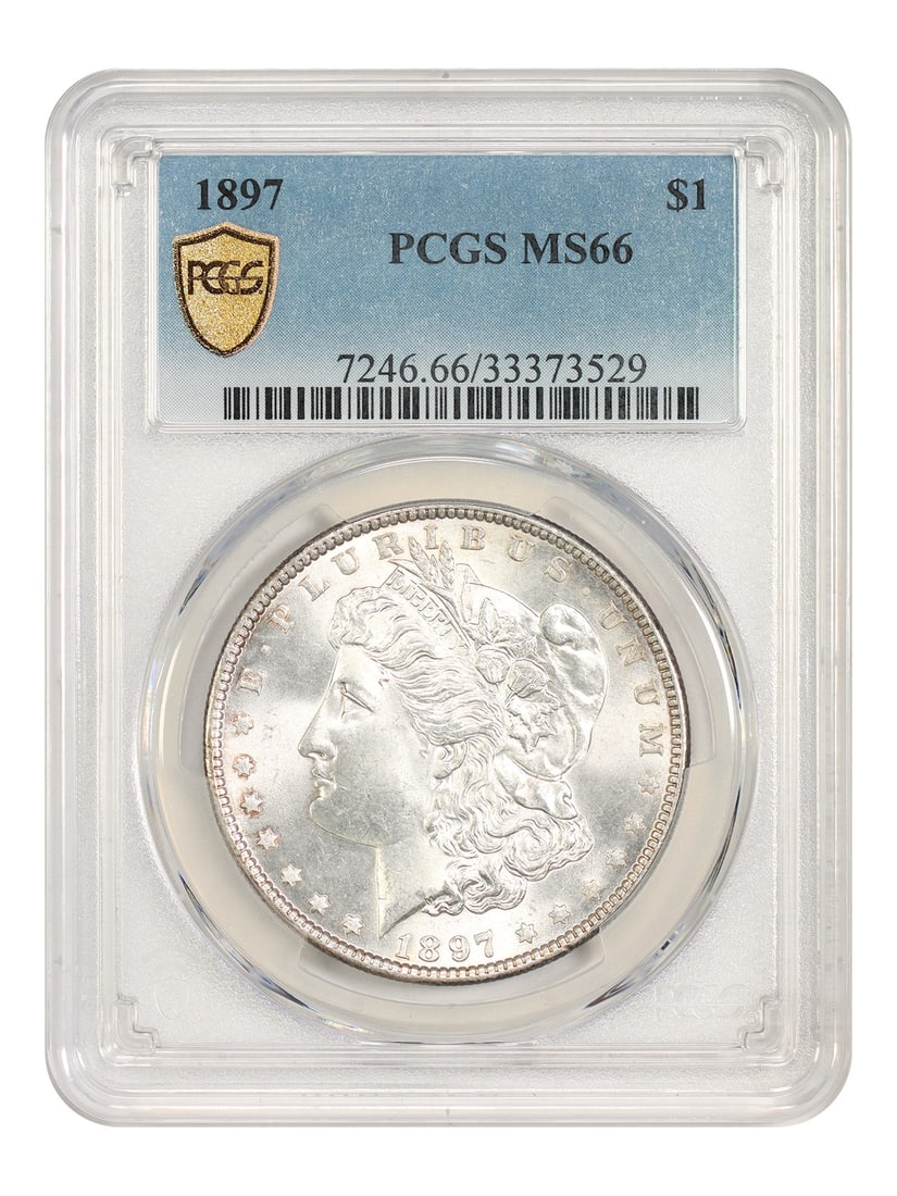 Morgan Dollar 1897 $1 PCGS MS66 Philadelphia Mint: Morgan Dollar 1897 $1 PCGS MS66 Philadelphia Mint 1897 Morgan Dollar $1 coin from the Philadelphia Mint, graded MS66 by PCGS. It is described as mostly white and radiating with strong luster. Pre-owne