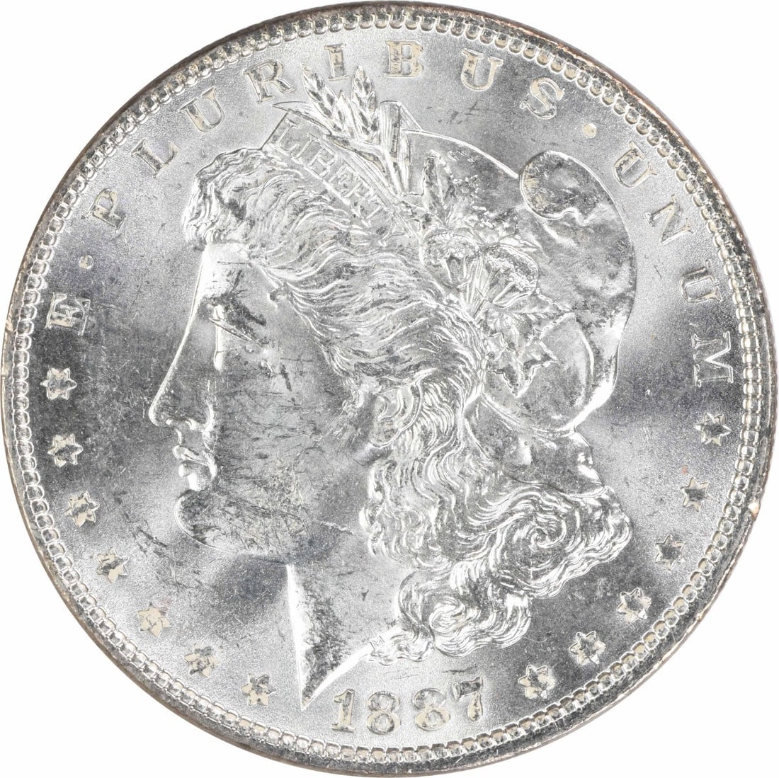 1887 Uncirculated Morgan Silver Dollar $1 Uncertified: 1887 Uncirculated Morgan Silver Dollar $1 Uncertified 1887 Morgan Silver Dollar in uncirculated condition. This pre-owned coin is uncertified and struck in silver. Specifications Coin: Morgan Silver D