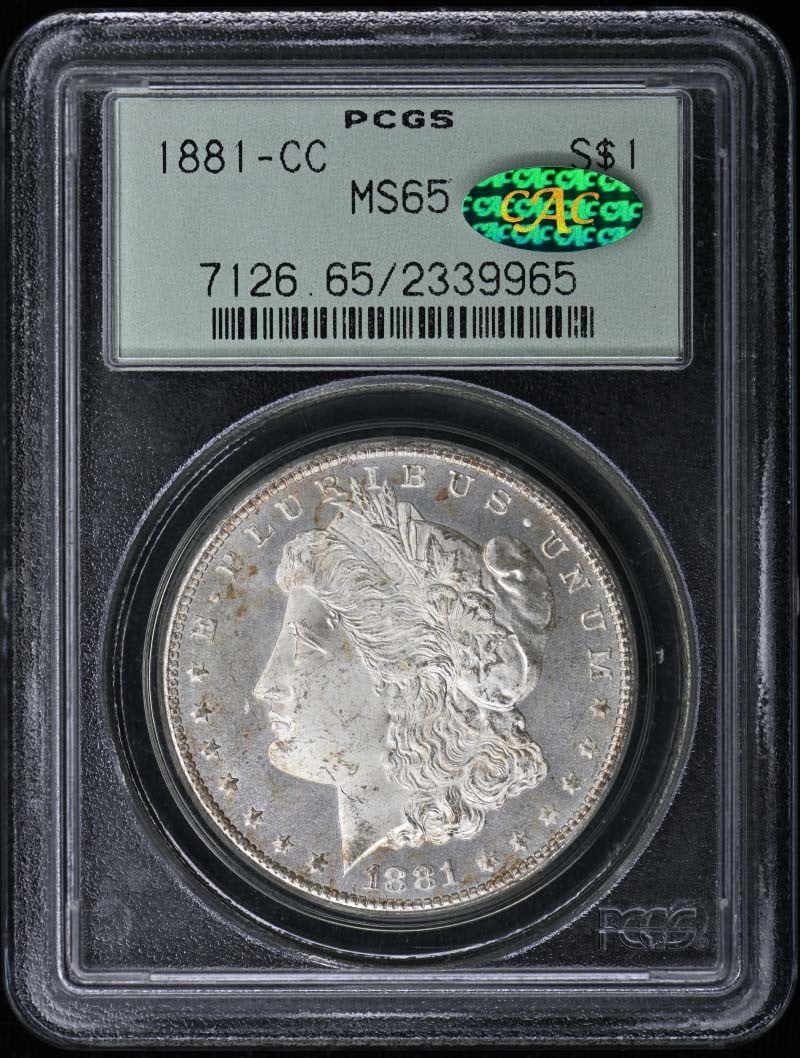PCGS MS65 CAC 1881 CC Morgan Silver Dollar: PCGS MS65 CAC 1881 CC Morgan Silver Dollar 1881 Morgan Dollar certified by PCGS in MS65 grade with CAC designation. This pre-owned coin is listed as uncirculated and is a Carson City issue. Specificat
