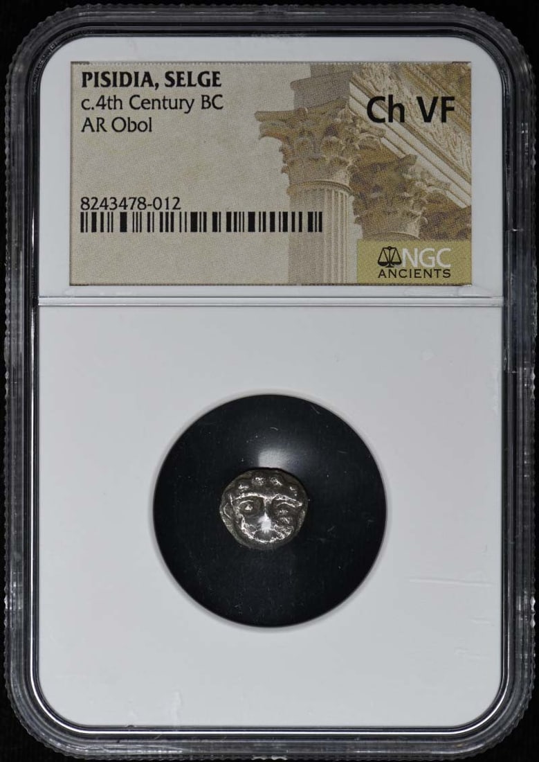 NGC certified Selge silver obol 4th century BC: NGC certified Selge silver obol 4th century BC This is a silver obol coin from the ancient city of Selge in Pisidia, dating to approximately the 4th century BC. The coin has been graded Choice Very Fi