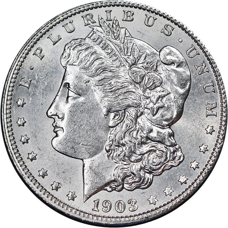 1903 P Morgan Silver Dollar Choice BU Uncertified: 1903 P Morgan Silver Dollar Choice BU Uncertified This 1903-P Morgan Silver Dollar is an uncirculated coin with bright white surfaces, excellent luster, and a strong strike. It is composed of 0.9 fine