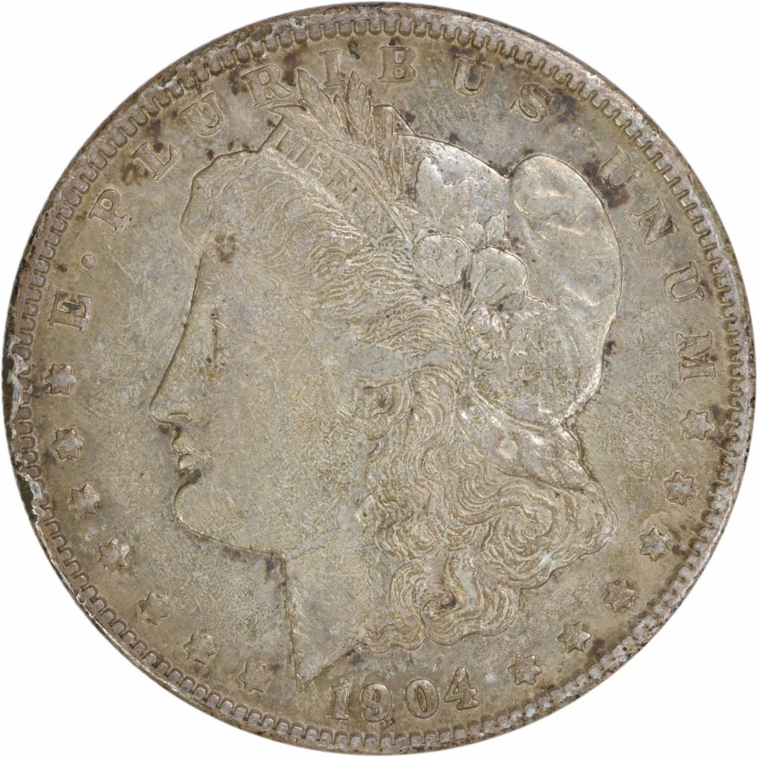 1904 Morgan Silver Dollar EF Uncertified 90% Silver Coin: 1904 Morgan Silver Dollar EF Uncertified 90% Silver Coin This 1904 Morgan Silver Dollar is a classic piece of American numismatics. It features an exquisite design by George T. Morgan, with a diameter