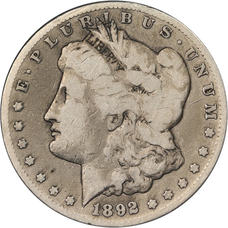 1892 CC Morgan Dollar Silver VG Carson City Mint Coin: 1892 CC Morgan Dollar Silver VG Carson City Mint Coin Original 1892-CC Morgan Silver Dollar with nice eye appeal, nice strike, color, and surfaces. This circulated coin is graded Nice VG and is pre-ow